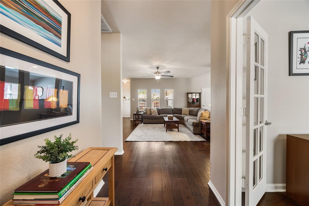 1260 Highbluff Lane Rockwall, TX 75087 - Photo 2 of 22 a view of a living room and dining room