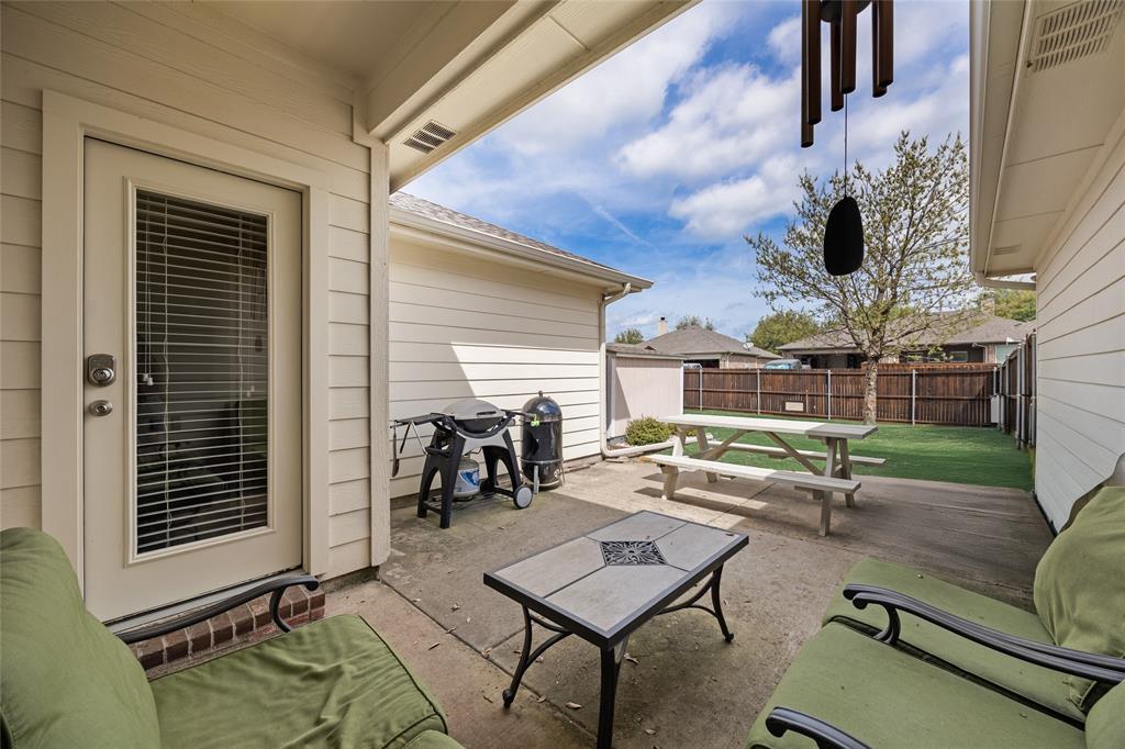 1260 Highbluff Lane Rockwall, TX 75087 - Photo 21 of 22 a building outdoor space with patio furniture