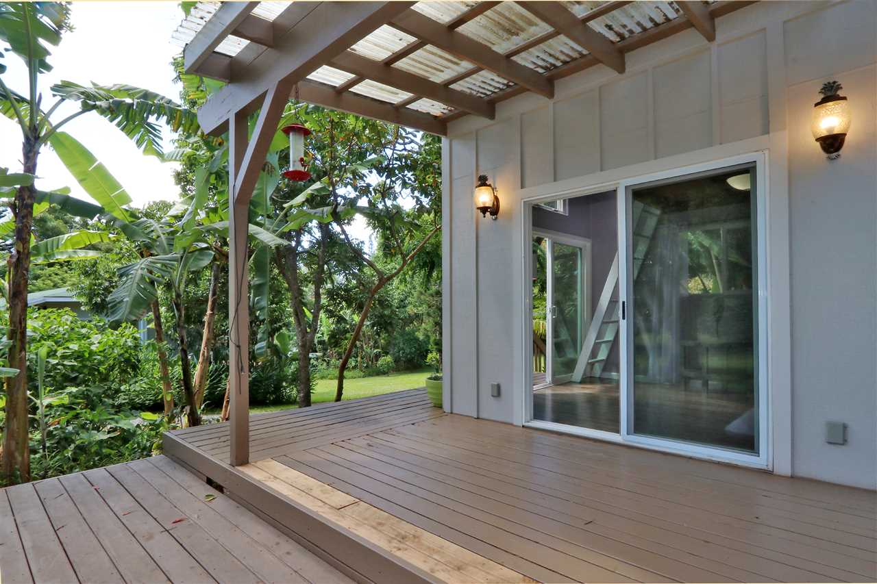 620 Awalau Road Haiku, HI 96708 - Photo 30 of 30 a view of a room with wooden floor and outdoor space