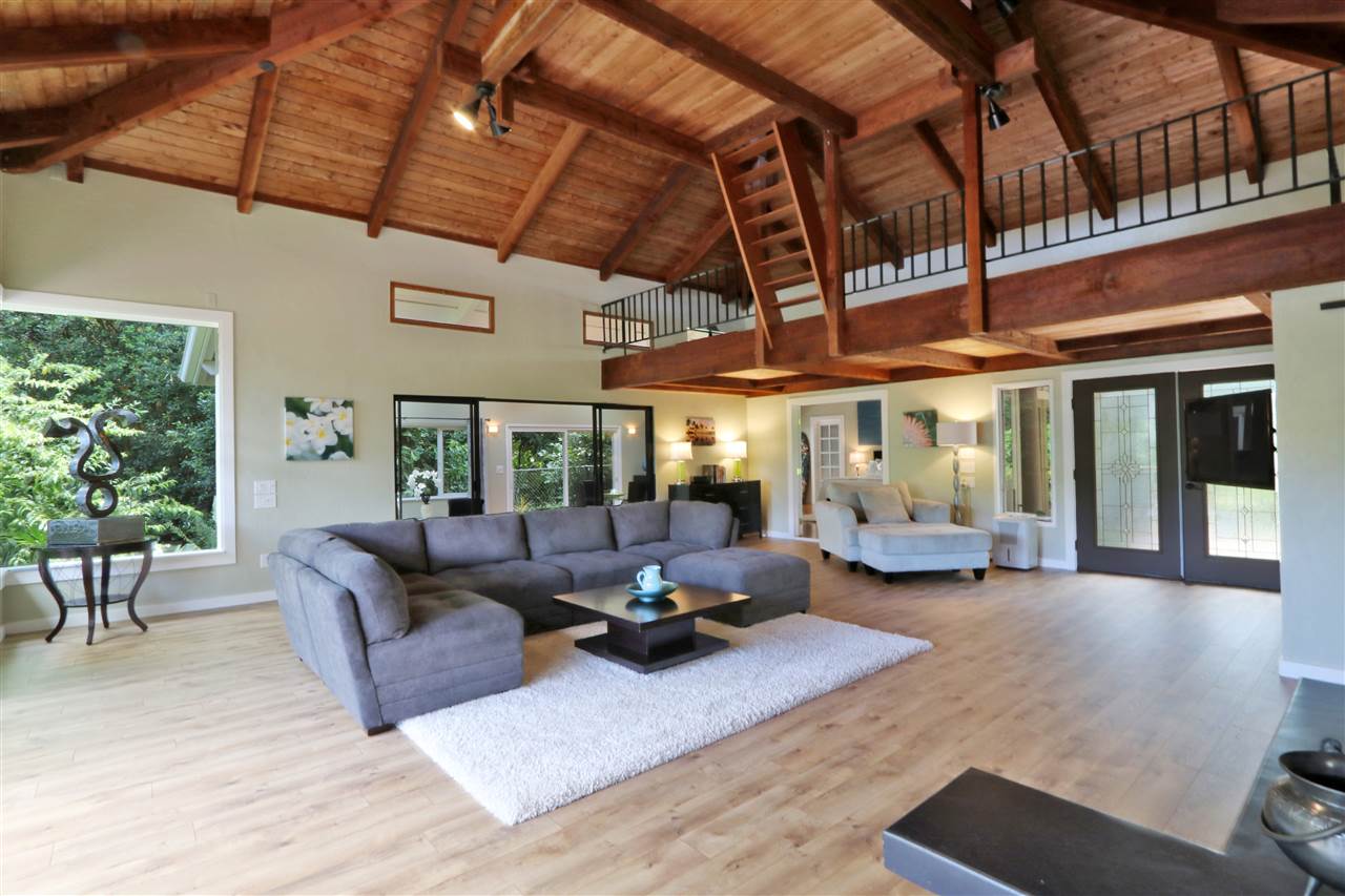 620 Awalau Road Haiku, HI 96708 - Photo 3 of 30 a living room with furniture and a large window