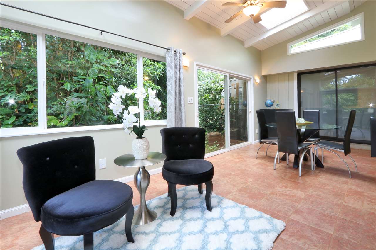 620 Awalau Road Haiku, HI 96708 - Photo 9 of 30 a living room with furniture and a large window