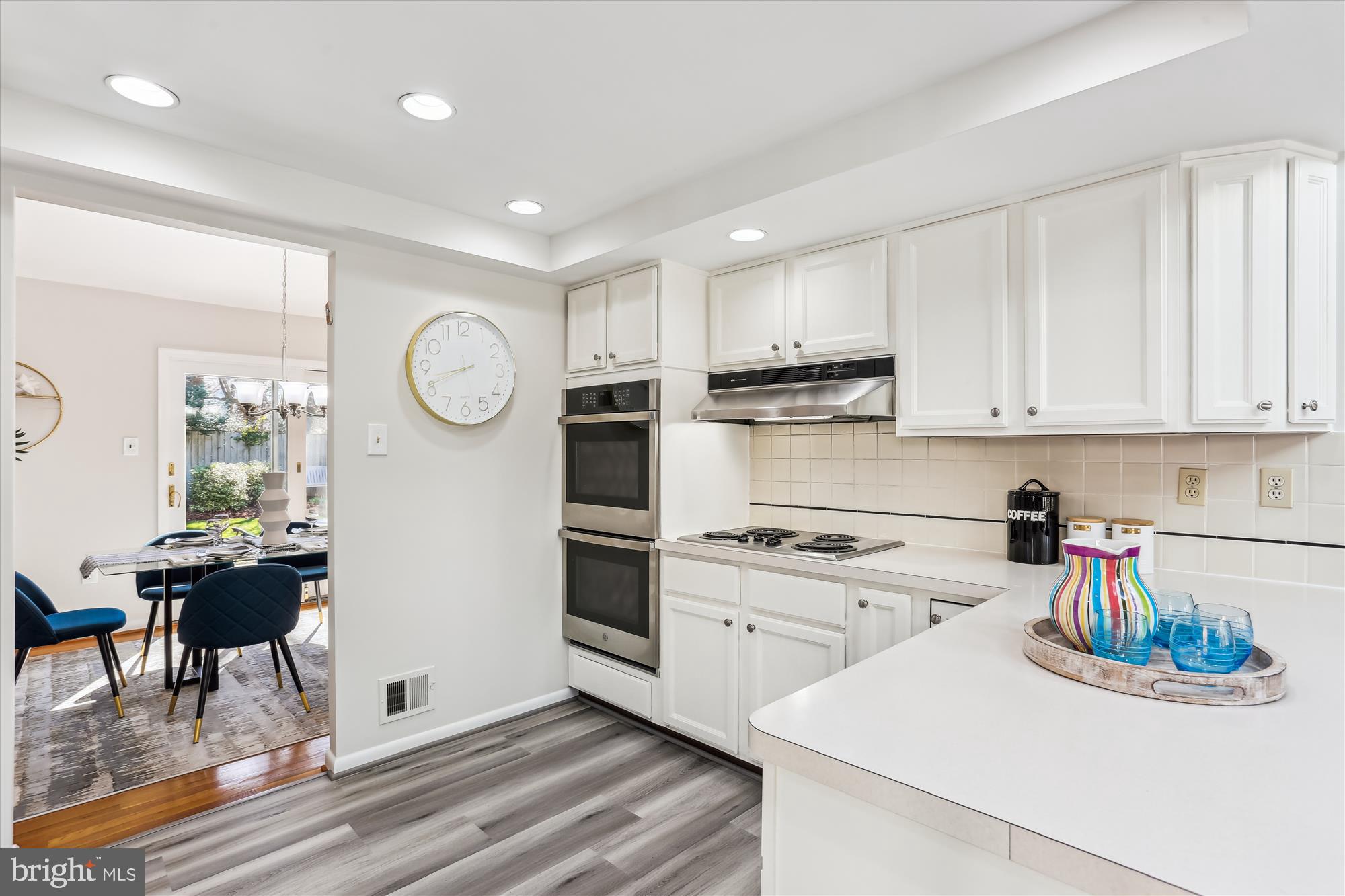 9 Fulham Court Silver Spring, MD 20902 - Photo 13 of 53 a kitchen with a sink cabinets and window