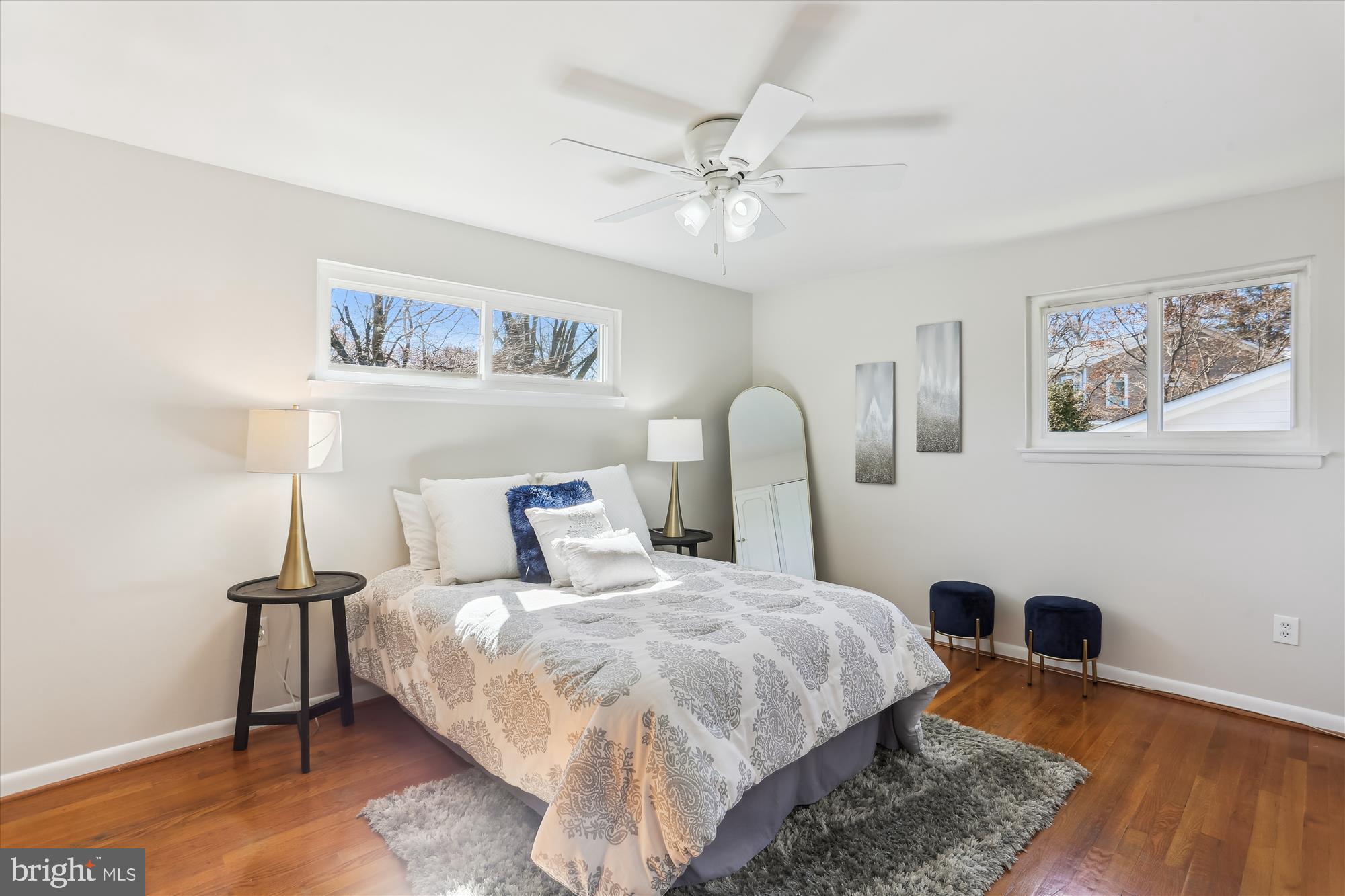 9 Fulham Court Silver Spring, MD 20902 - Photo 19 of 53 a bedroom with a bed and a table in it