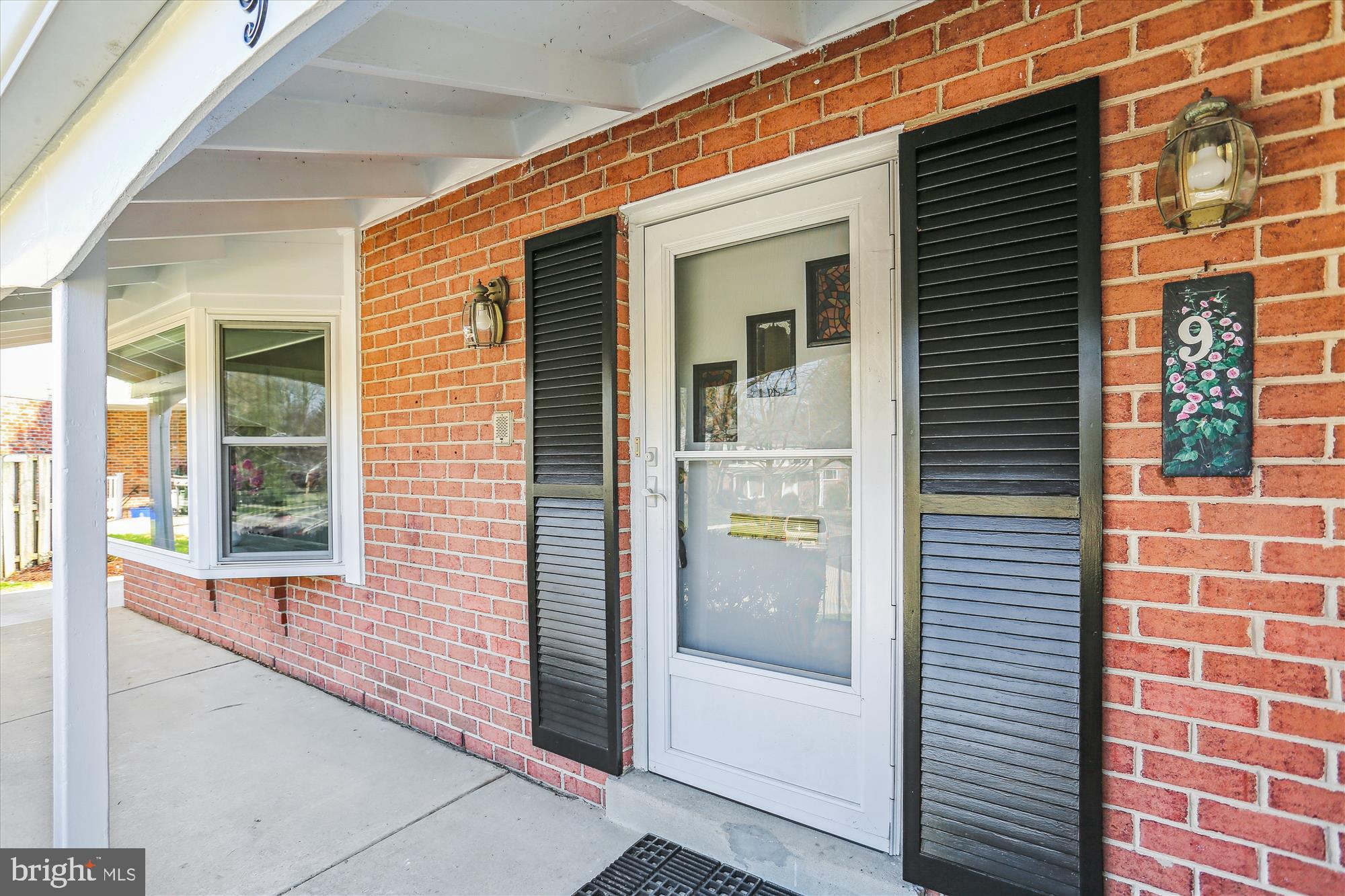 9 Fulham Court Silver Spring, MD 20902 - Photo 2 of 53 a view of a door and brick walls