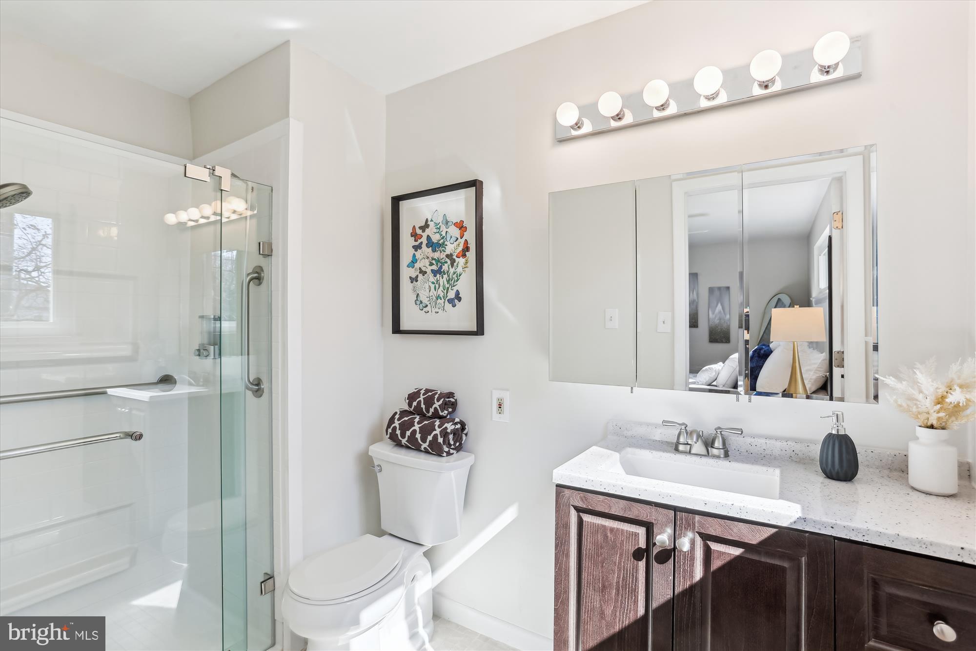 9 Fulham Court Silver Spring, MD 20902 - Photo 22 of 53 a bathroom with a sink vanity granite and a mirror