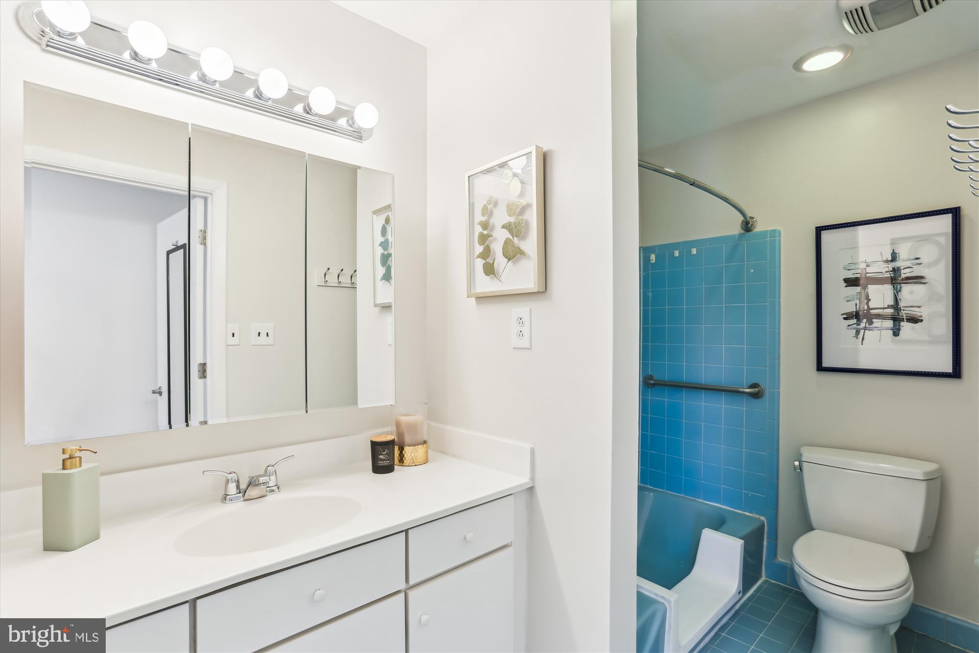 9 Fulham Court Silver Spring, MD 20902 - Photo 28 of 53 a bathroom with a sink toilet and shower