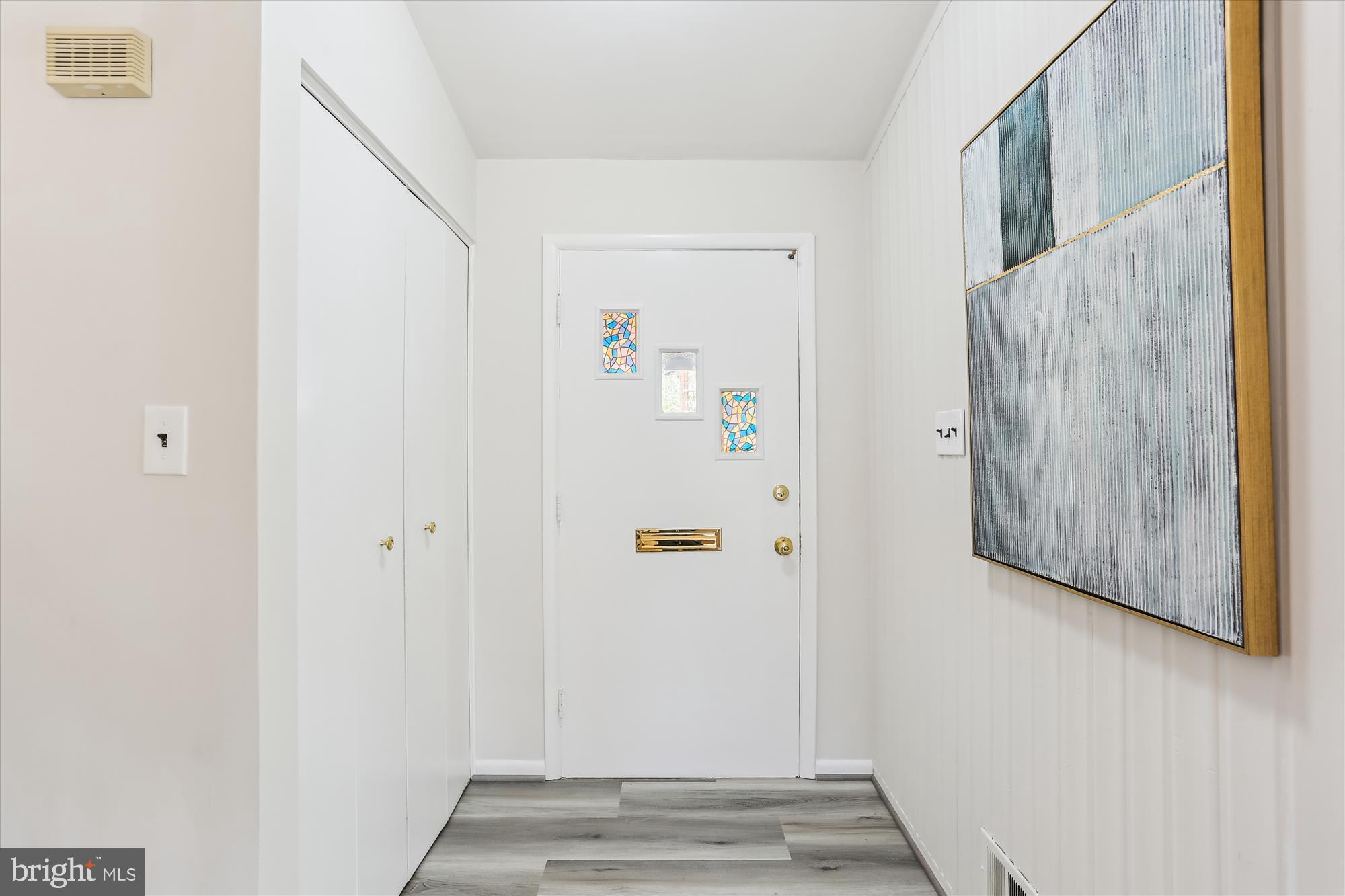 9 Fulham Court Silver Spring, MD 20902 - Photo 3 of 53 a view of front door with wooden floor