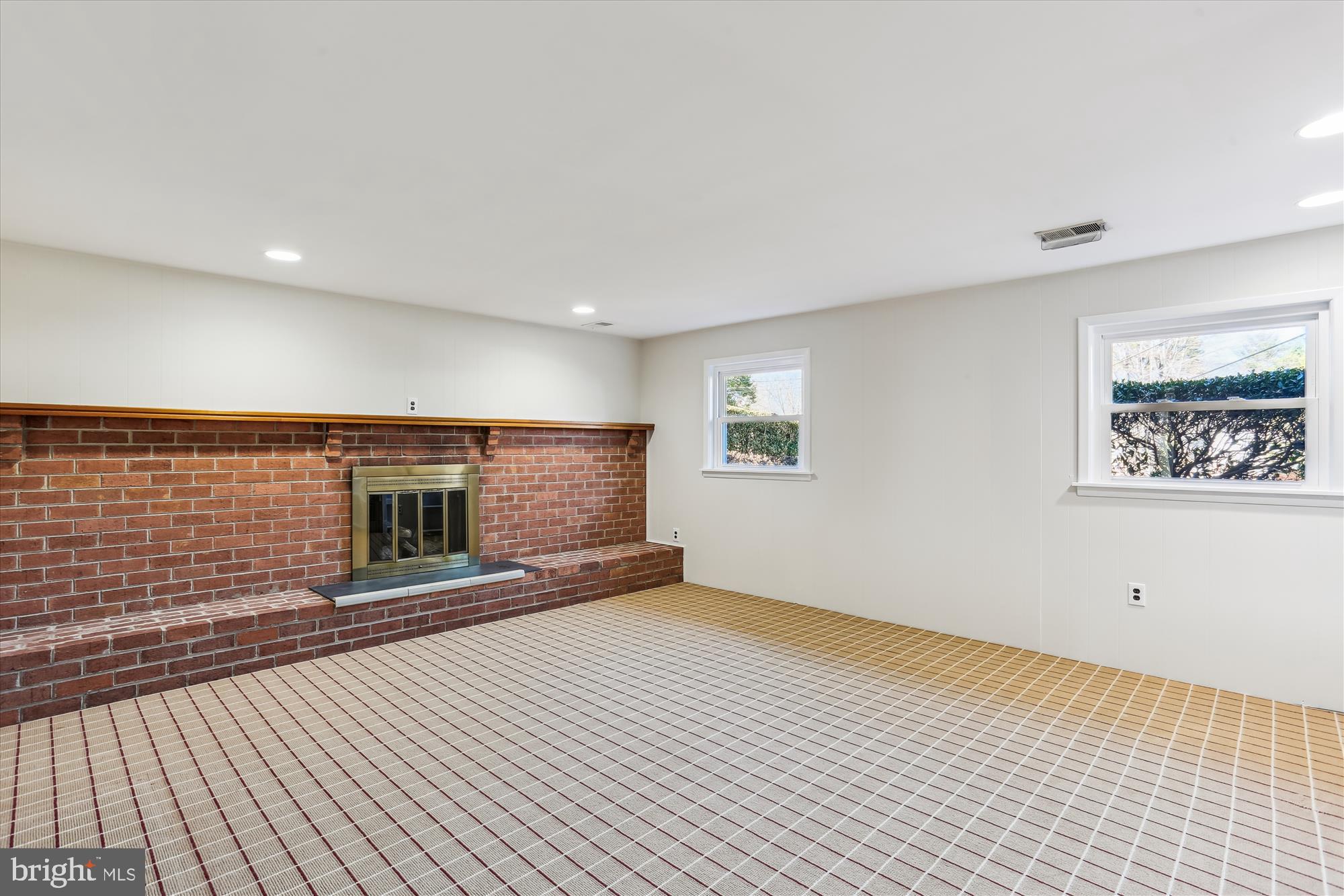9 Fulham Court Silver Spring, MD 20902 - Photo 31 of 53 a view of an empty room with a fireplace