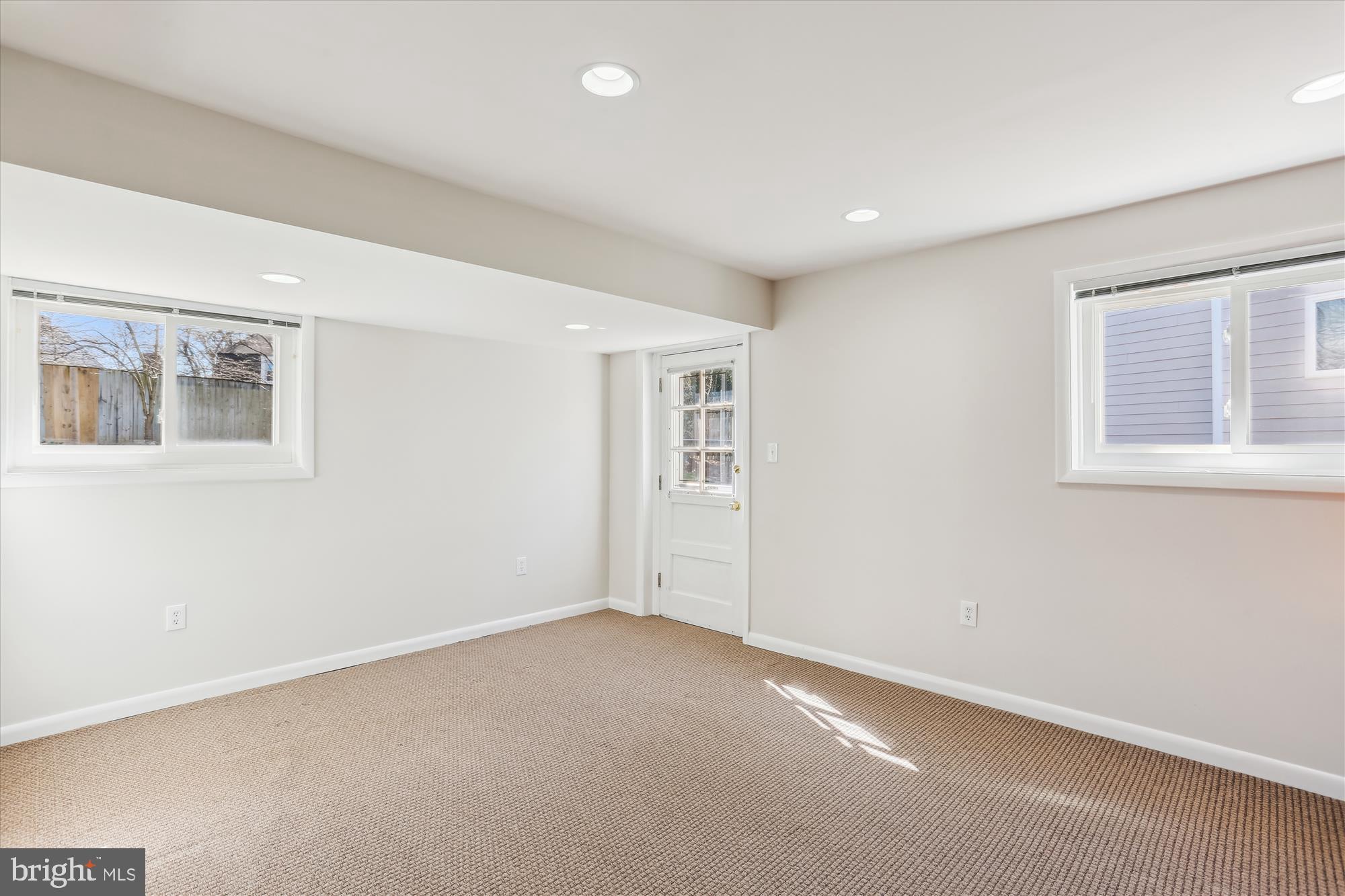9 Fulham Court Silver Spring, MD 20902 - Photo 35 of 53 a view of an empty room with a window