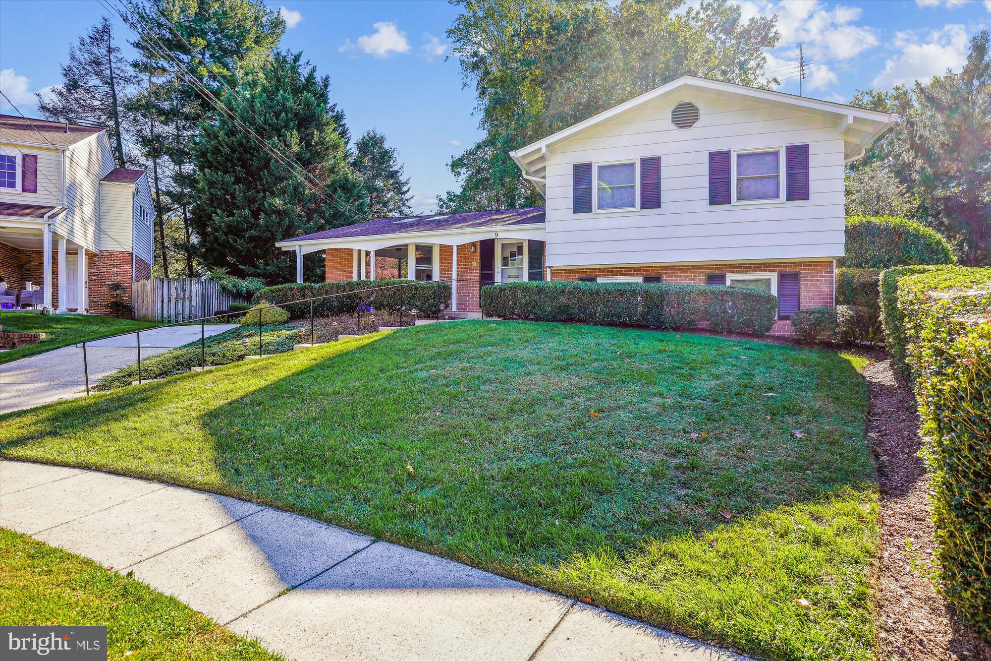 9 Fulham Court Silver Spring, MD 20902 - Photo 40 of 53 a front view of a house with garden