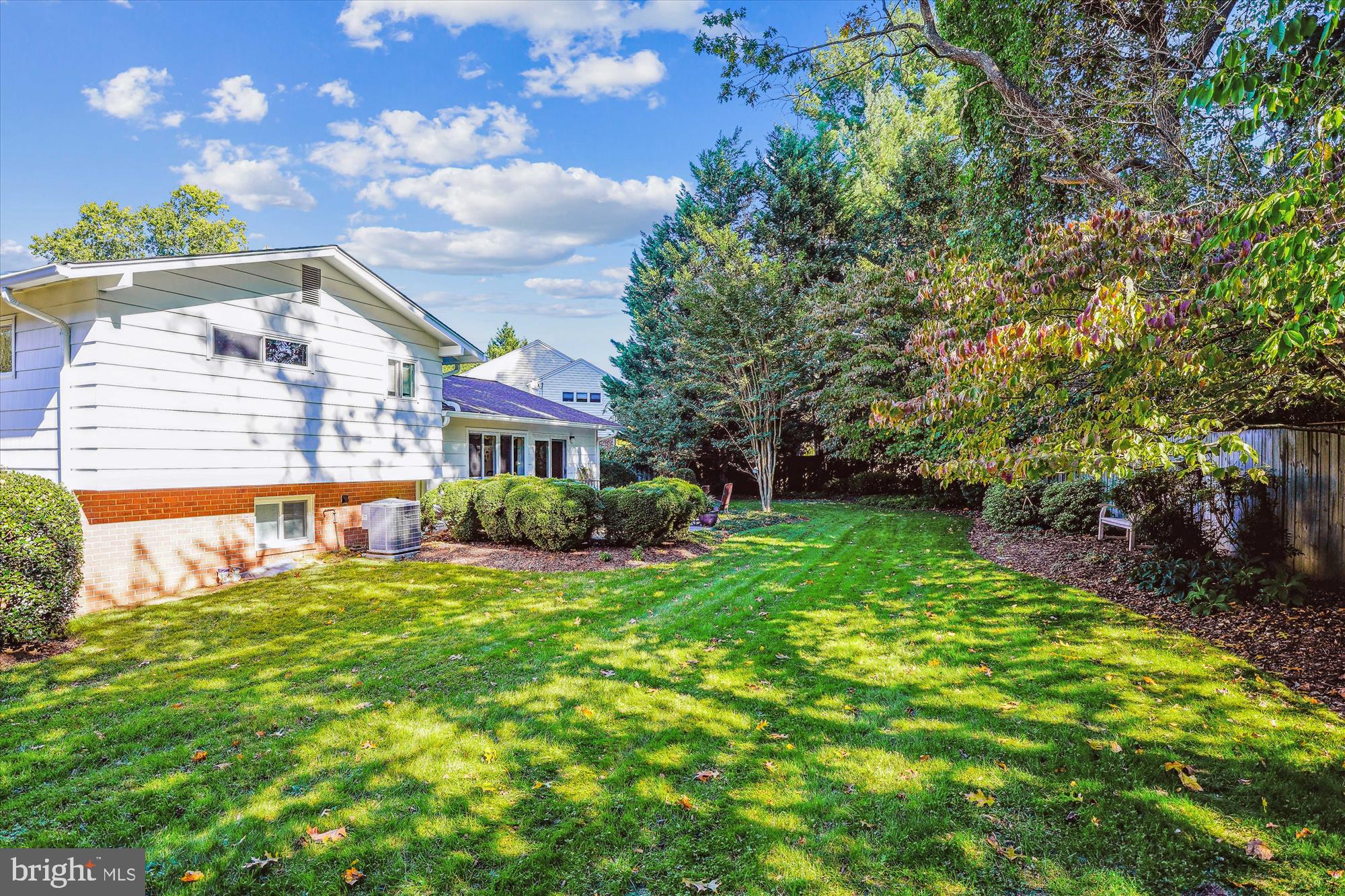 9 Fulham Court Silver Spring, MD 20902 - Photo 43 of 53 a view of a house with a big yard potted plants and large tree