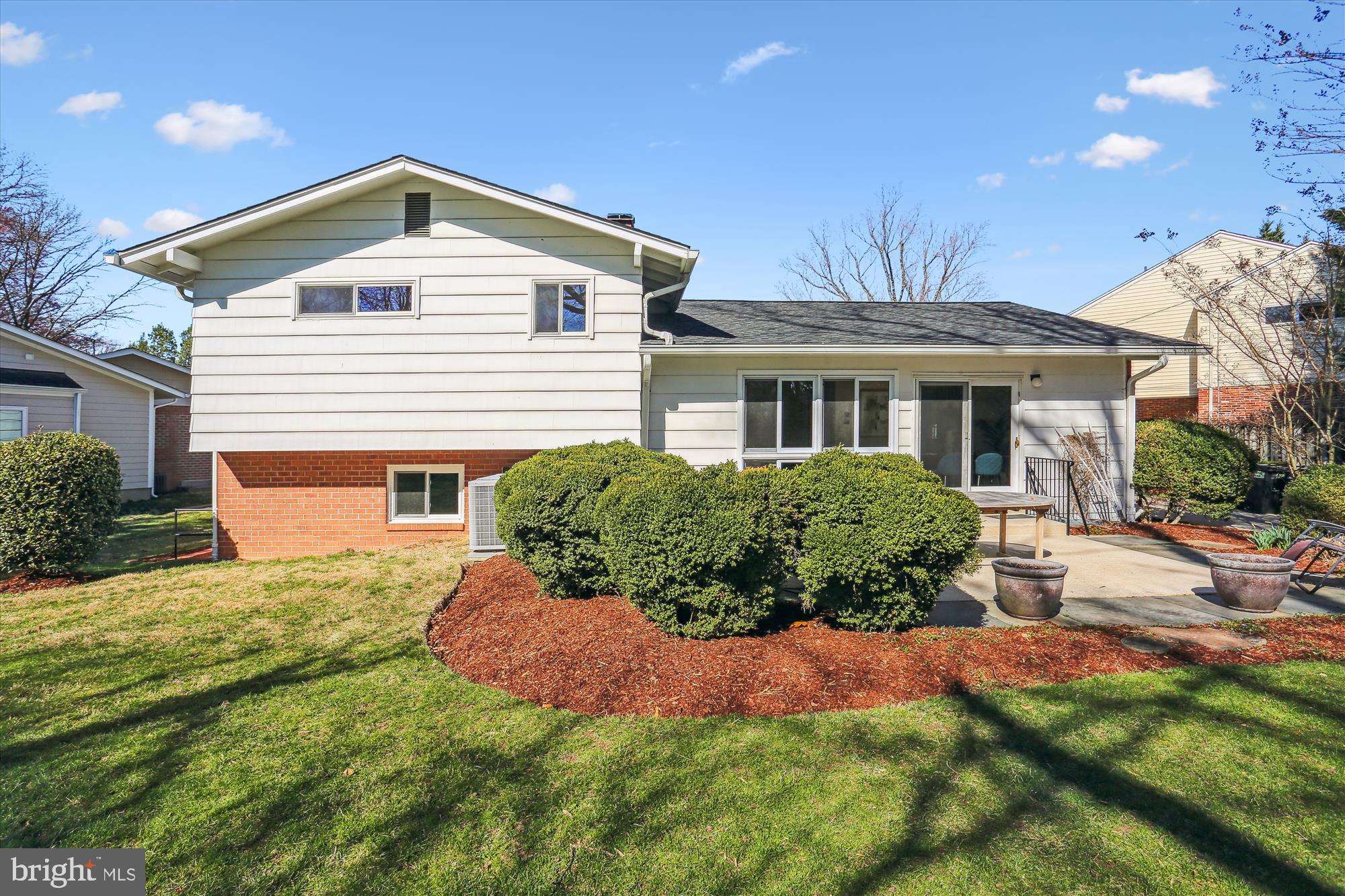9 Fulham Court Silver Spring, MD 20902 - Photo 45 of 53 a front view of a house with a yard