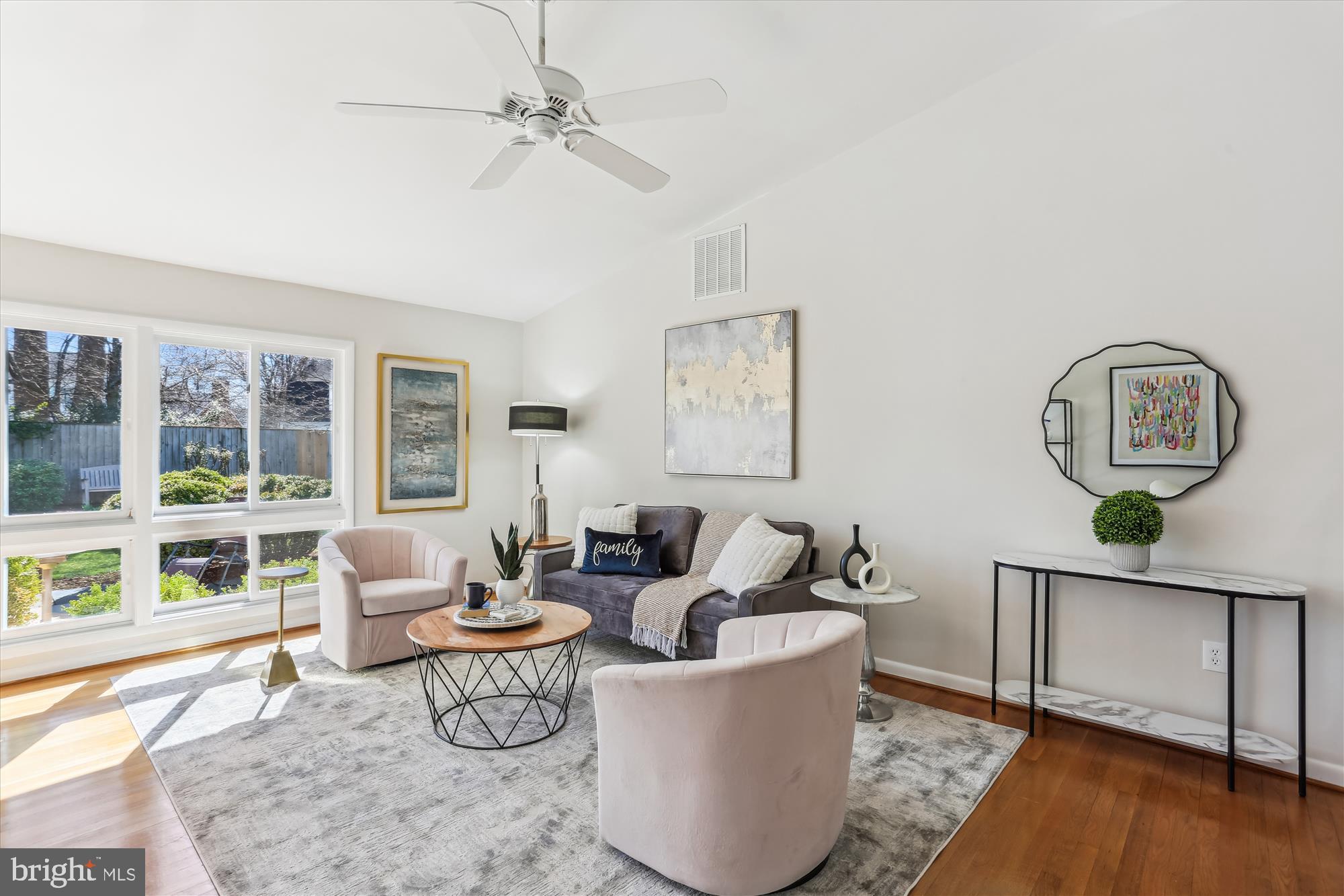 9 Fulham Court Silver Spring, MD 20902 - Photo 6 of 53 a living room with furniture a window and a chandelier