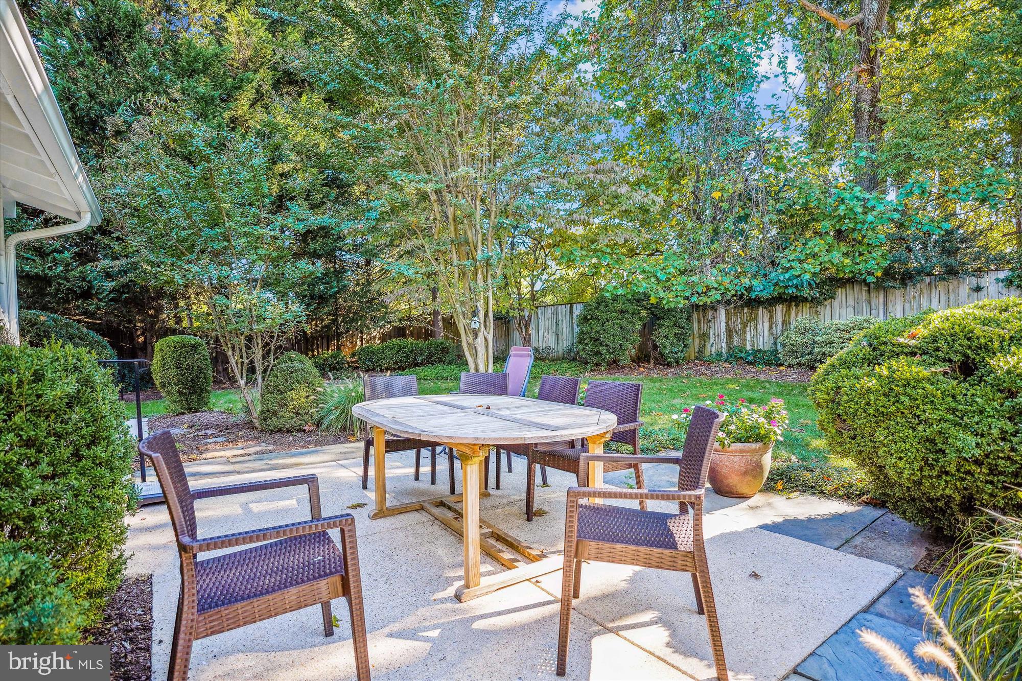 9 Fulham Court Silver Spring, MD 20902 - Photo 9 of 53 a view of a chairs and table in backyard