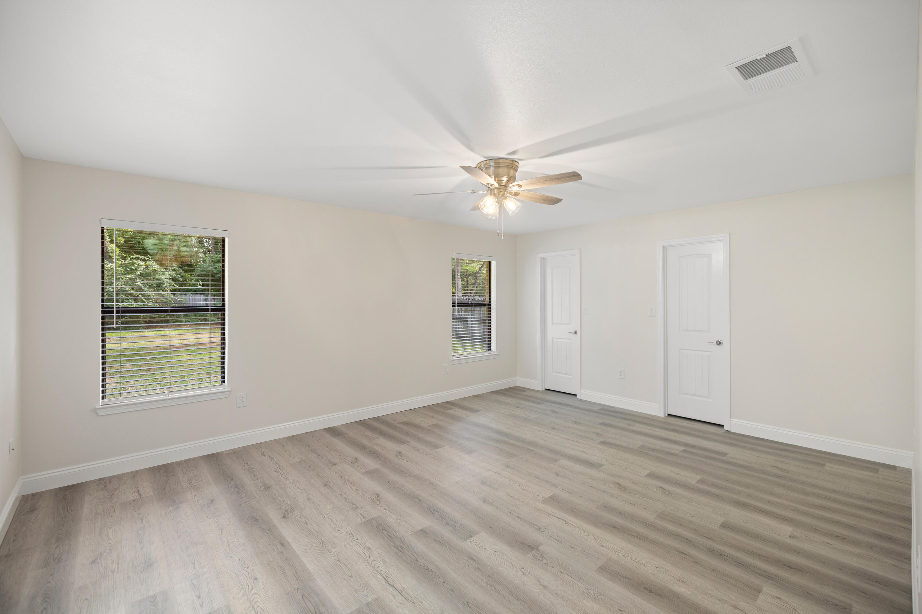 433 Barbados Way Niceville, FL 32578 - Photo 31 of 65 a view of an empty room with a window