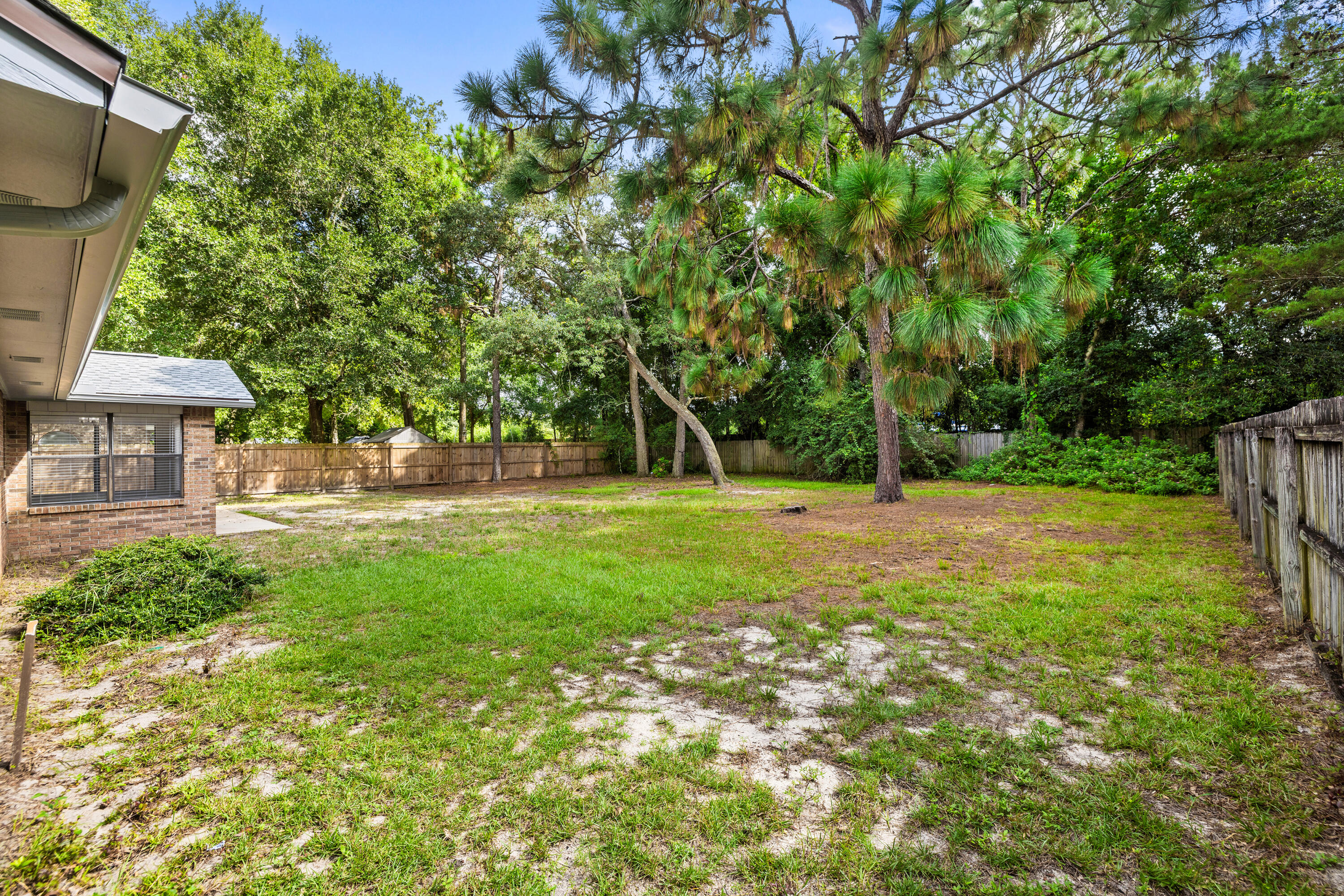 433 Barbados Way Niceville, FL 32578 - Photo 51 of 65 a view of green field with trees