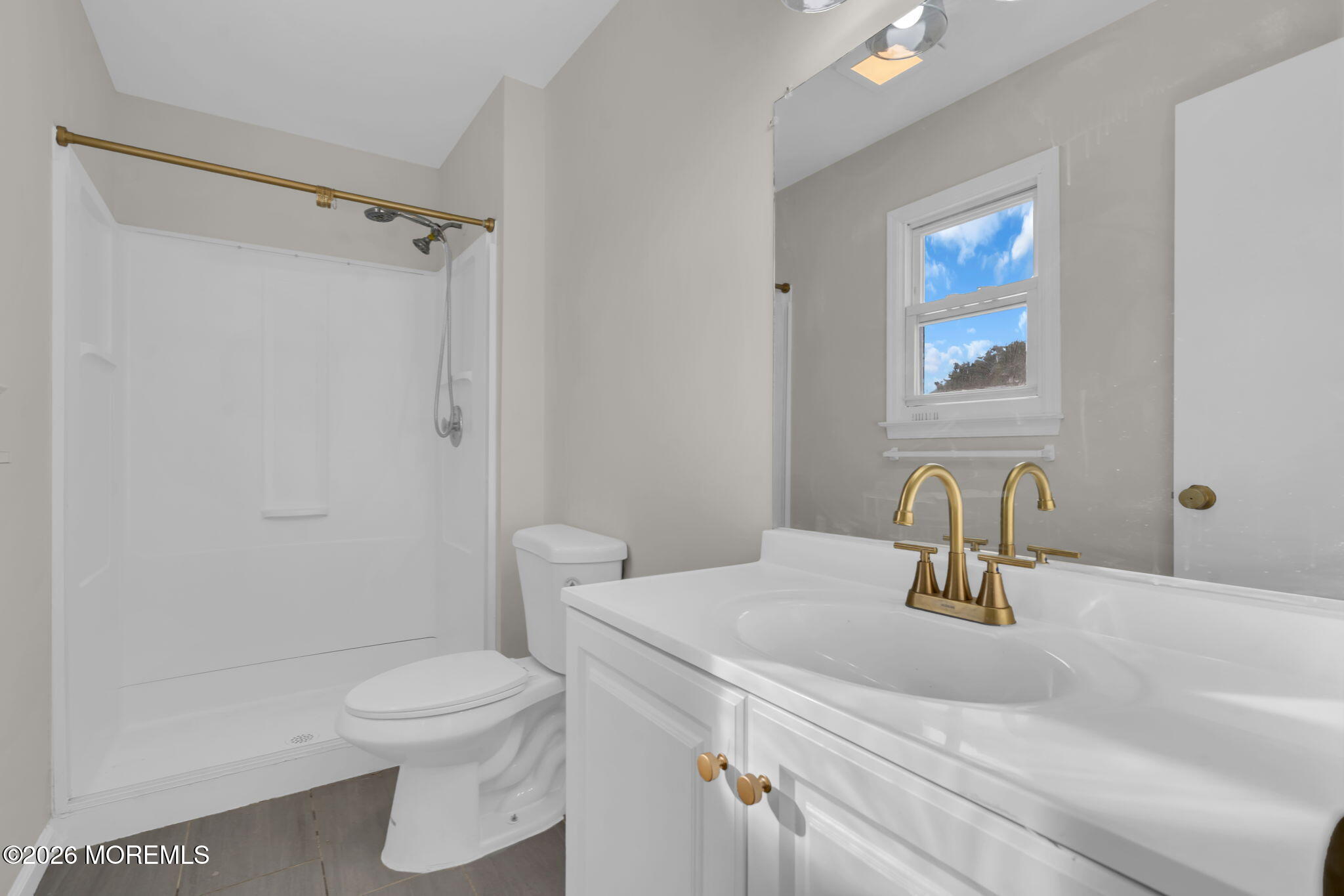 45 Peachstone Road Howell, NJ 07731 - Photo 36 of 54 a bathroom with a sink toilet and shower