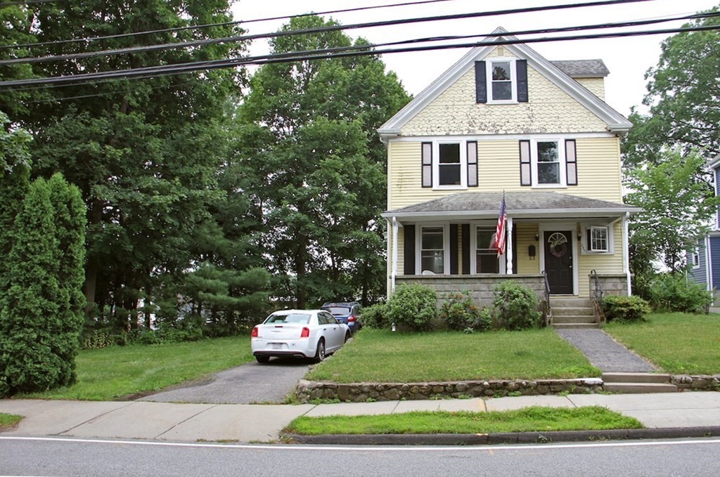 284 Webster Street Newton, MA 02466 - Photo 1 of 1 a front view of a house with a yard