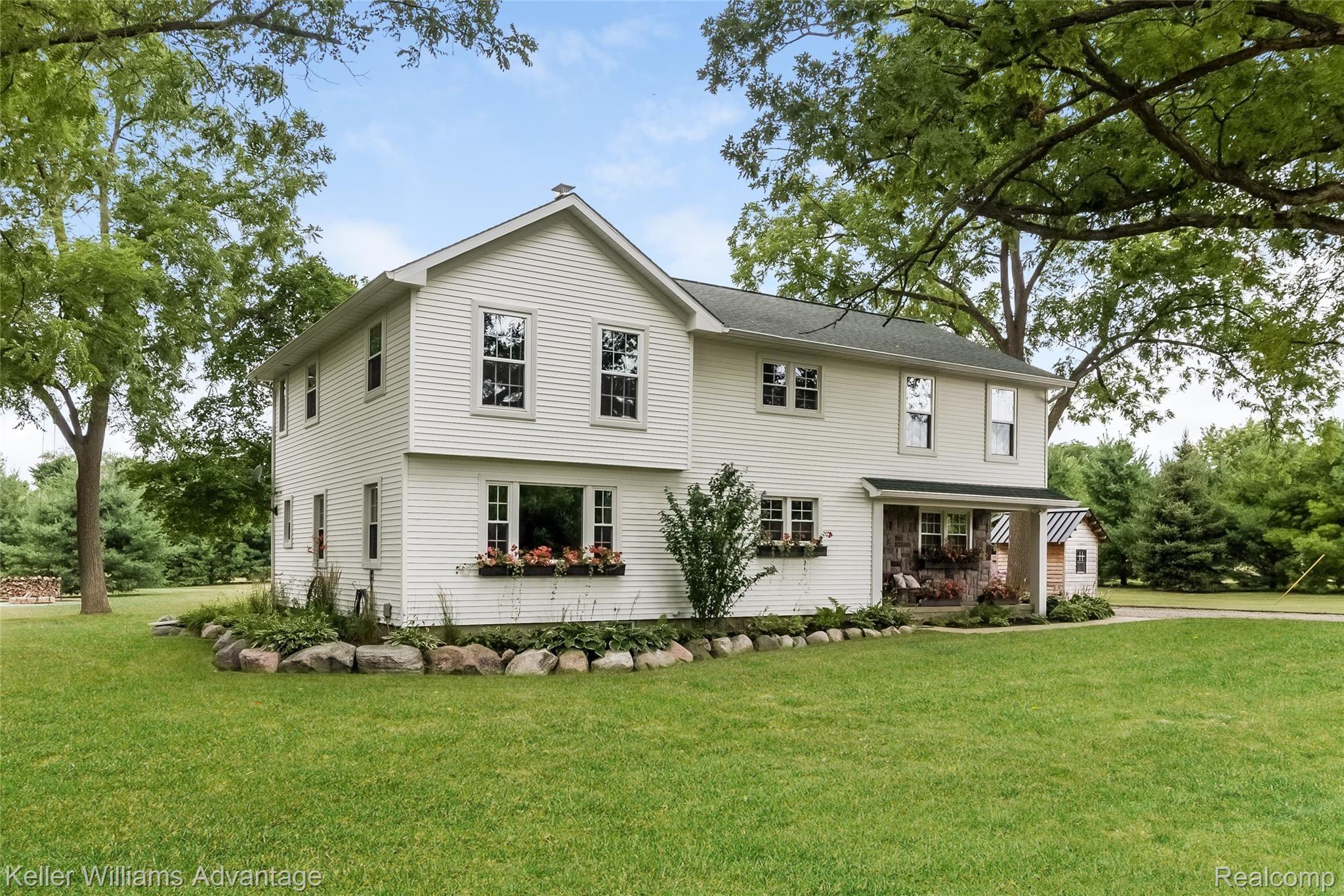 5385 Mack Road Howell, MI 48855 - Photo 10 of 59 Move-in ready modern farmhouse. 2885 square feet, 4 bedrooms, 3 full bathrooms. Built in 1920. Fully updated, beautifully maintained, and immaculate.
