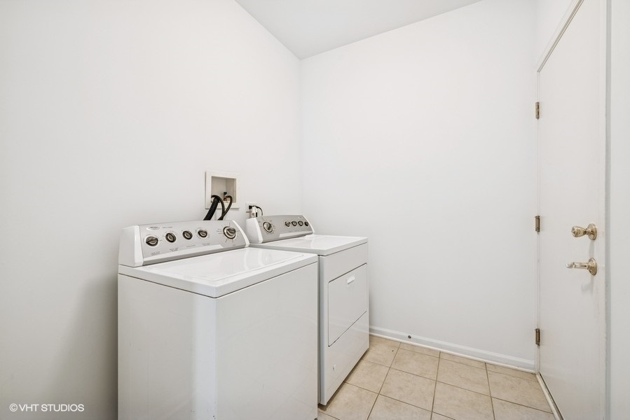 1541 Millbrook Drive, Unit 1541 Algonquin, IL 60102 - Photo 15 of 17 a utility room with dryer and washer