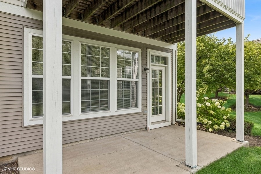 1541 Millbrook Drive, Unit 1541 Algonquin, IL 60102 - Photo 16 of 17 a view of front door