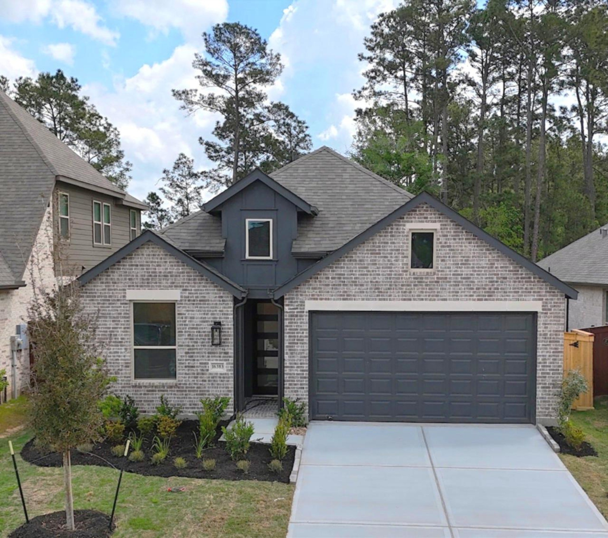16383 Placid Strm Street Conroe, TX 77302 - Photo 15 of 15 a front view of a house with garage