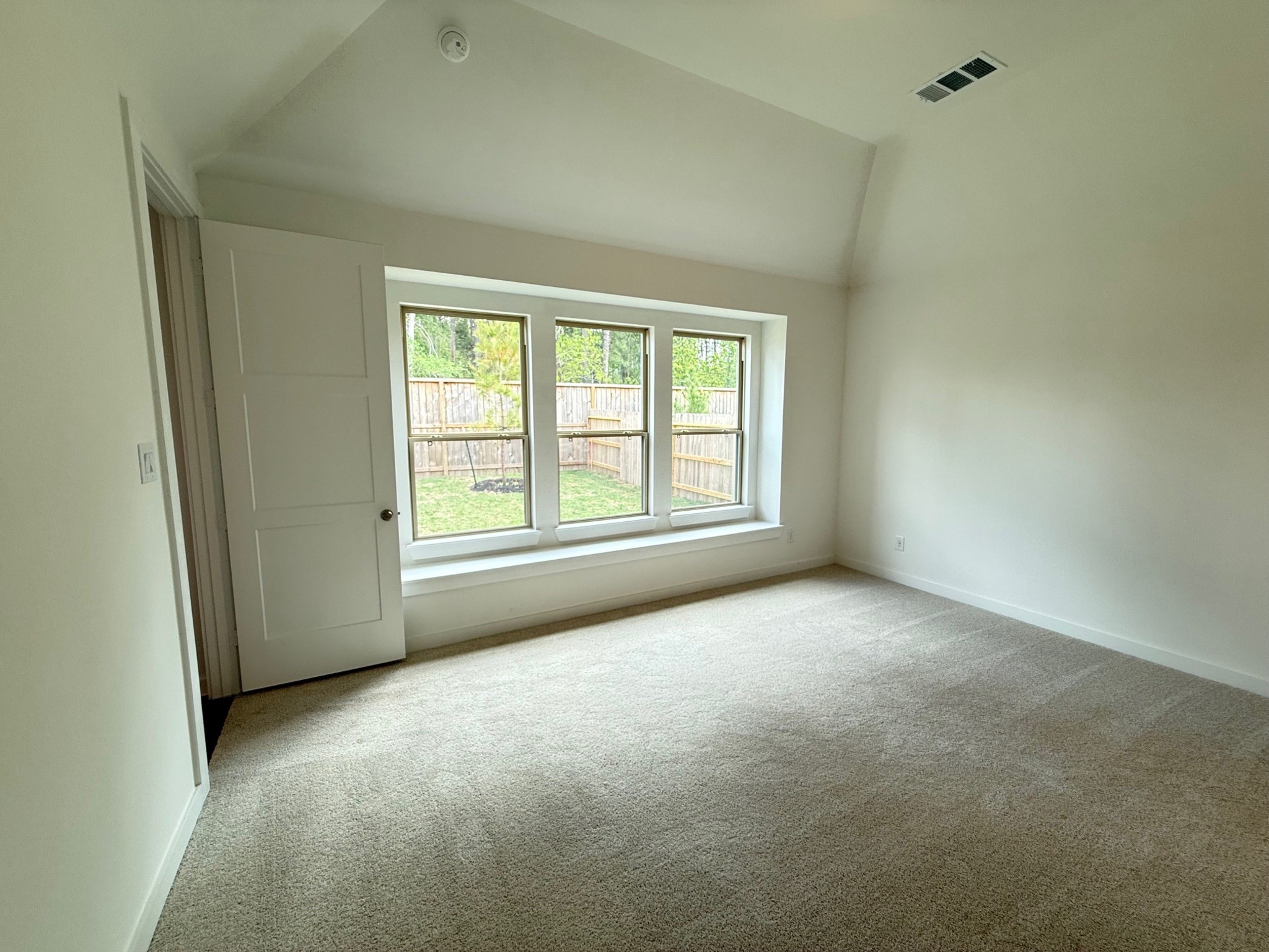 16383 Placid Strm Street Conroe, TX 77302 - Photo 5 of 15 an empty room with windows