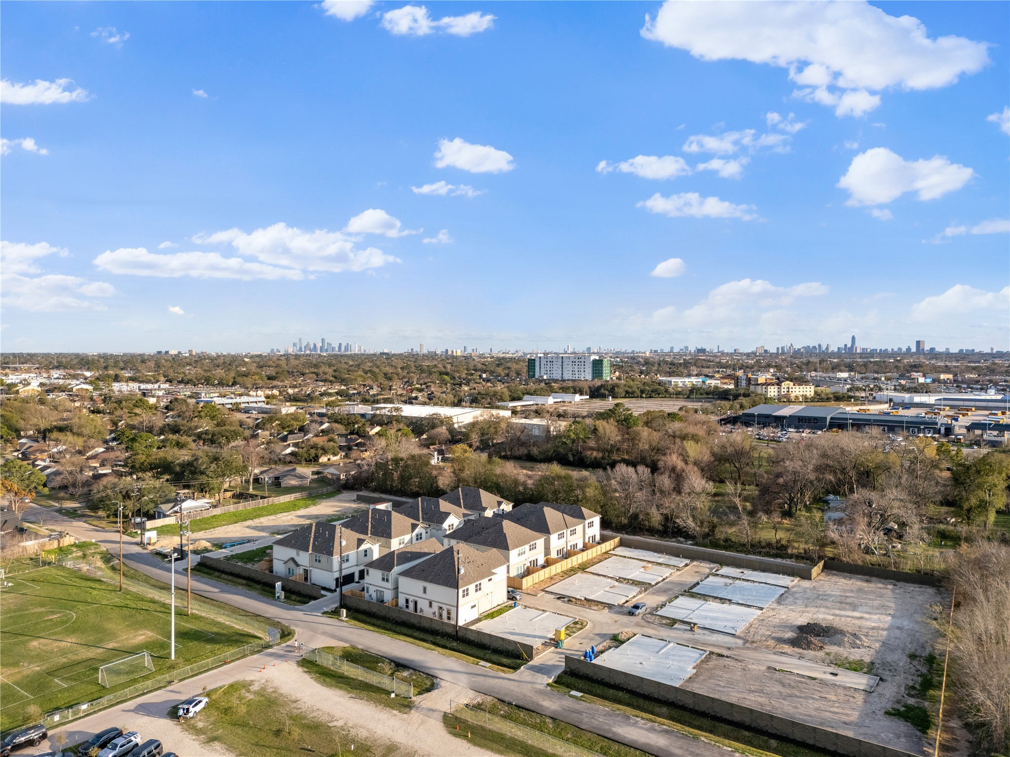 6451 Rena Street Houston, TX 77092 - Photo 33 of 33 Tucked near open green space with the downtown skyline on the horizon, this location delivers quiet living without disconnecting you from the city.
