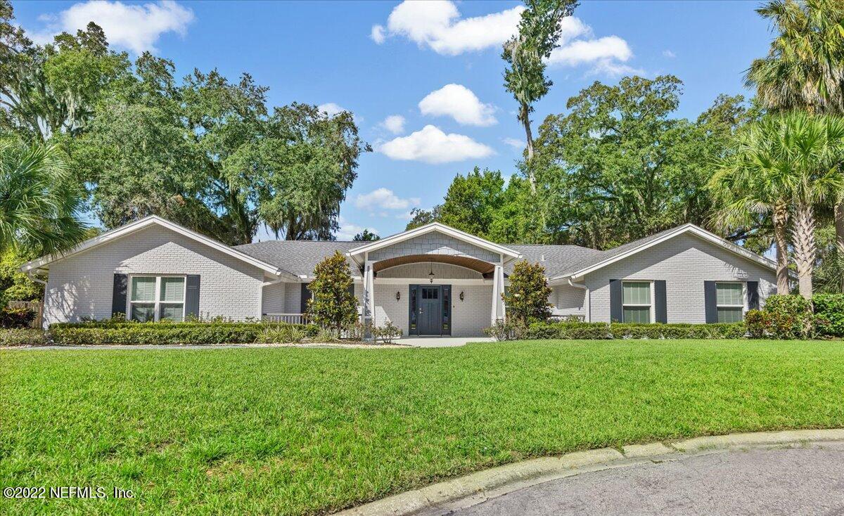 9410 Woodhaven Road Jacksonville, FL 32257 - Photo 1 of 27 a front view of house with yard and green space