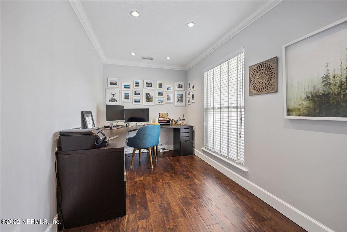 9410 Woodhaven Road Jacksonville, FL 32257 - Photo 4 of 27 a living room with furniture and a wooden floor