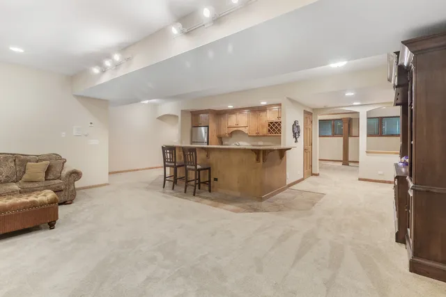 a living room with furniture and a table
