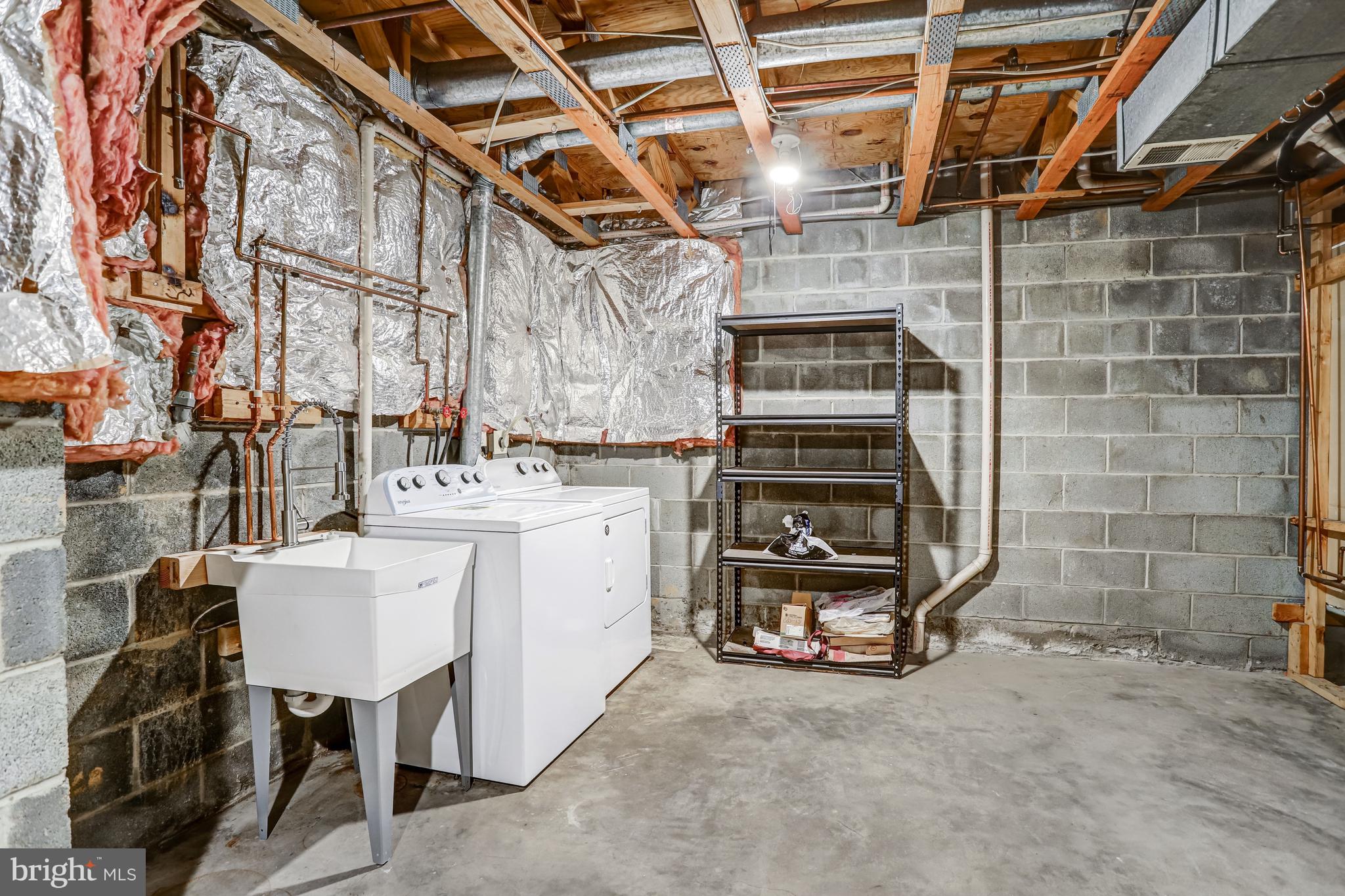 1953 Lakeport Way Reston, VA 20191 - Photo 37 of 60 a utility room with dryer and washer