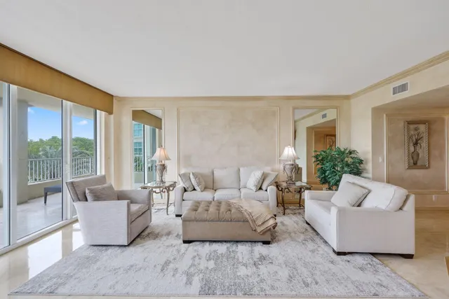 a view of a balcony with furniture