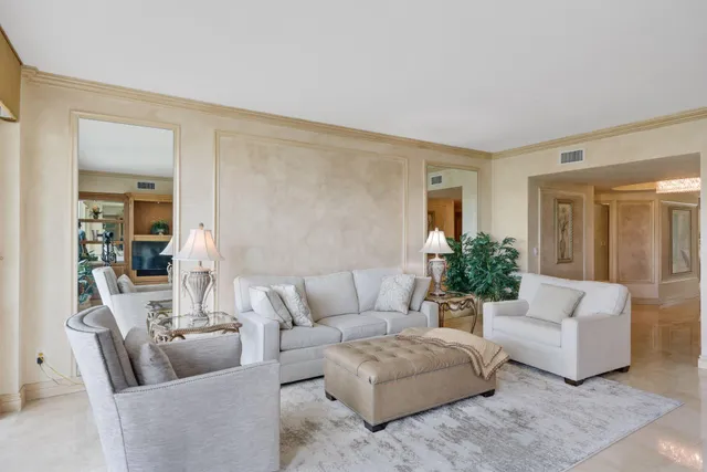 a view of balcony with floor to ceiling windows