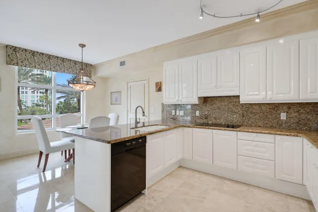 a view of a balcony and dining area
