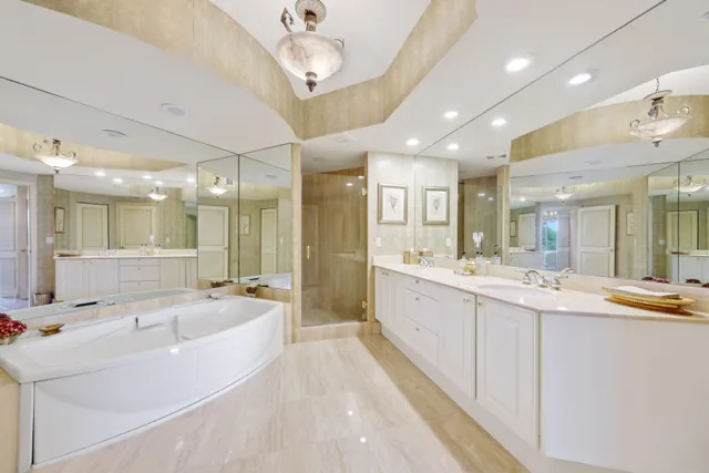 a front view of multi story residential apartment building with outdoor space