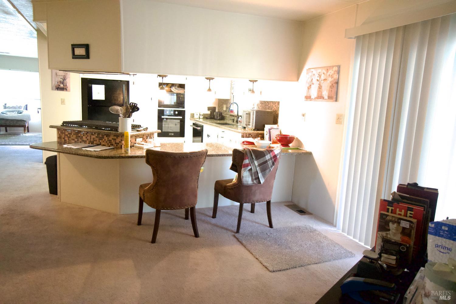 41 Plymouth Way Santa Rosa, CA 95403 - Photo 16 of 28 Looking toward the kitchen from the family room.