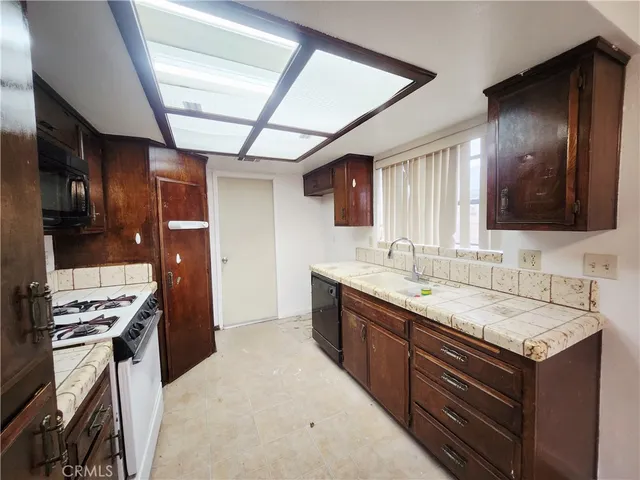 a bathroom with a sink double vanity and a mirror