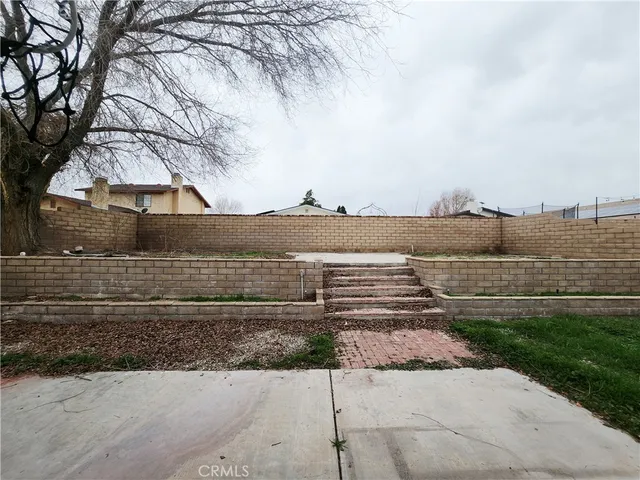 a view of a street with a building in the background