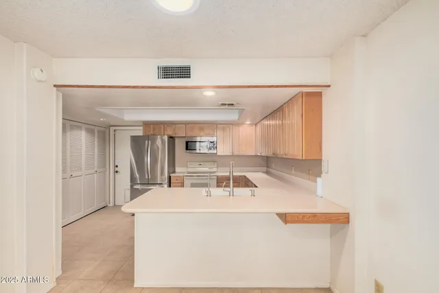 a bathroom with a sink a toilet and a bathtub