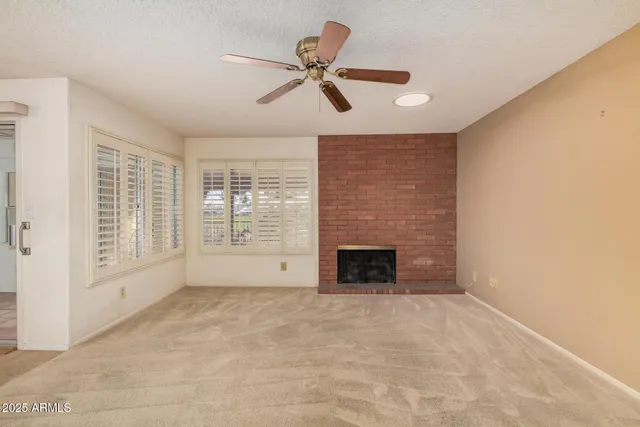 a kitchen with a sink stove and microwave