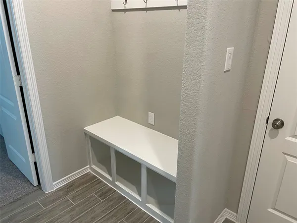 a bathroom with a sink and vanity