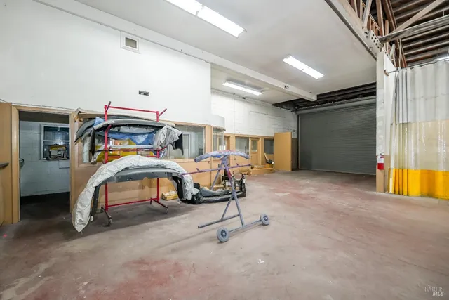 a room with furniture and musical instruments