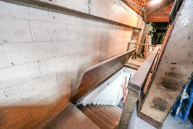 a room with furniture and workspace