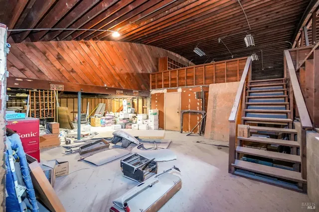 a room with furniture and a wooden floor