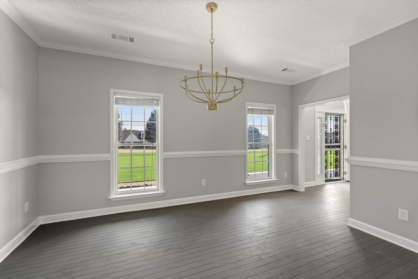 369 Rosemark Road Atoka, TN 38004 - Photo 11 of 27 a view of wooden floor and windows in a room