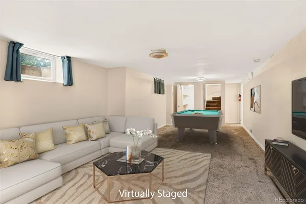 a living room with furniture and a couch