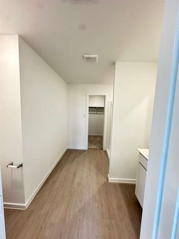 11570 Antrrim Place Place Rhome, TX 76078 - Photo 13 of 17 a view of wooden floor in an empty room