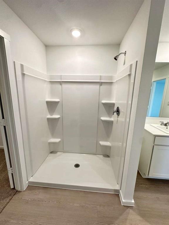 11570 Antrrim Place Place Rhome, TX 76078 - Photo 15 of 17 a bathroom with a shower