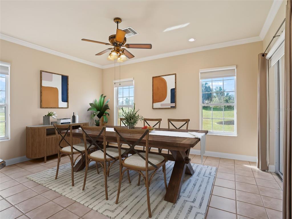 1412 Meadow View Way Lady Lake, FL 32159 - Photo 11 of 37 a dining room with furniture and window